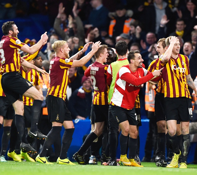 Bradford players celebrate following their team's 4-2 victory during the FA Cup fourth   round match against Chelsea at Stamford Bridge