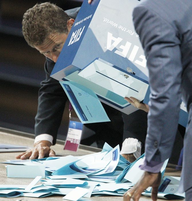 FIFA officials count ballots at the end of FIFA's presidential election duirng   the 61st FIFA congress at the Hallenstadion in Zurich June 1, 2011