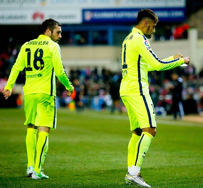 Neymar, right, of FC Barcelona celebrates