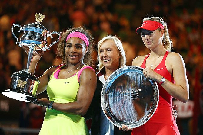 Martina Navratilova poses with Serena Williams and Maria Sharapova after the presentation ceremony following the Australian Open women's final