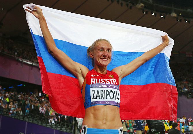 Yuliya Zaripova of Russia celebrates after winning the gold medal in the Women's 3000m Steeplechase at the London 2012 Olympic Games