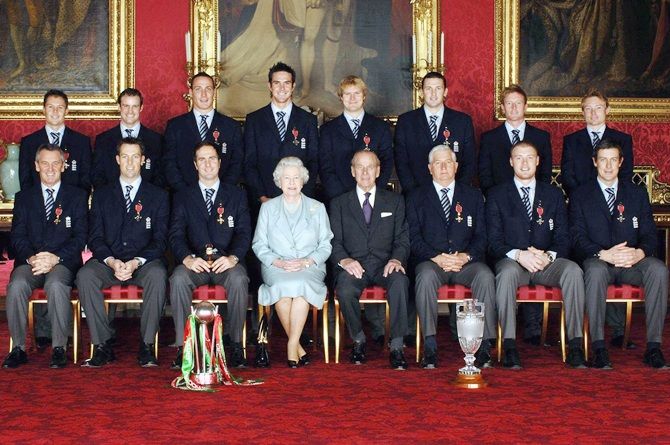 Queen Elizabeth II and the Duke of Edinburgh pose with members of England's 2005 Ashes winning Cricket team