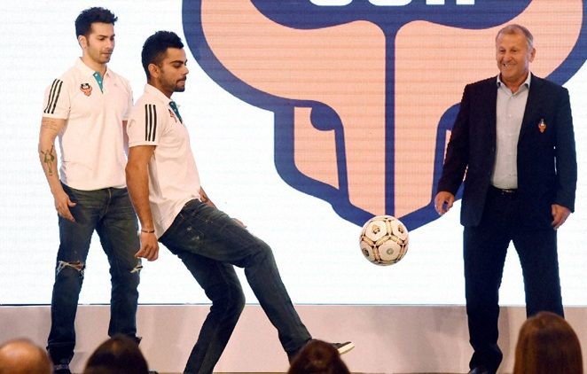 FC Goa's co owner Virat Kohli, left, with Zico at a promotional event