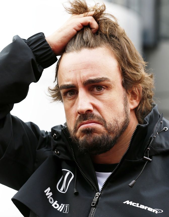 McLaren Honda's Fernando Alonso speaks with members of the media during preview to the Formula One Grand Prix of Austria 