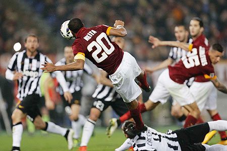 AS Roma's Seydou Keita heads the ball to score against Juventus during their Serie A match at the Olympic stadium in Rome on March 2 