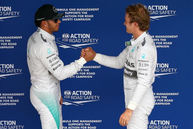 Nico Rosberg of Germany greets Lewis Hamilton of Great Britain
