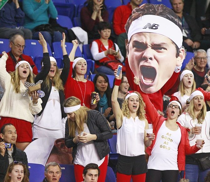 Canadian fans cheer for Milos Raonic during his Davis Cup match