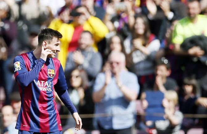  Barcelona's Lionel Messi celebrates a goal against Rayo Vallecano during their La Liga match at Camp Nou stadium in Barcelona on Sunday