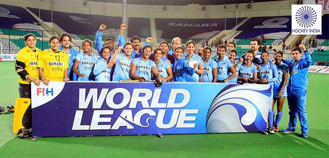 Players and offcials of the India hockey team celebrate their World Hockey League final victory over Poland on Sunday