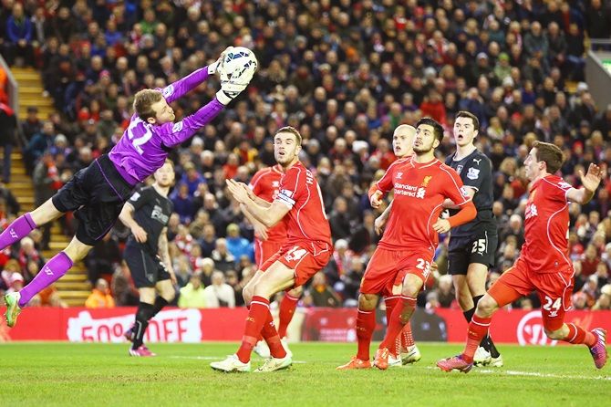 Simon Mignolet of Liverpool makes a save