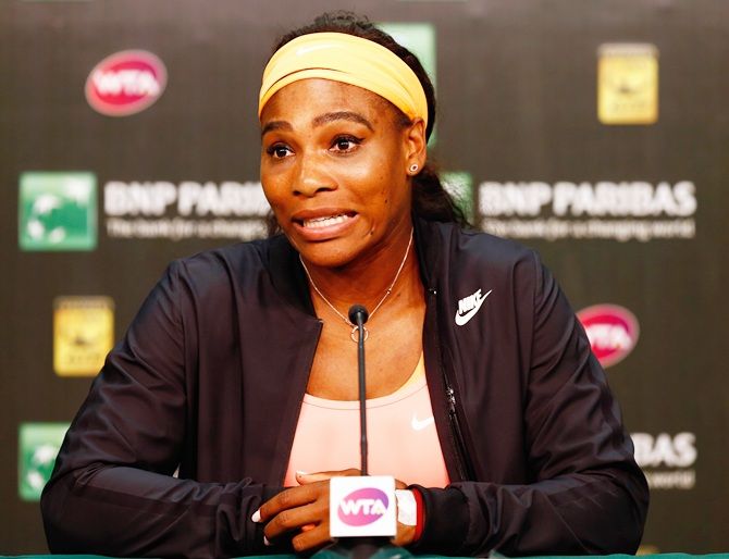 Serena Williams of USA talks to the media
