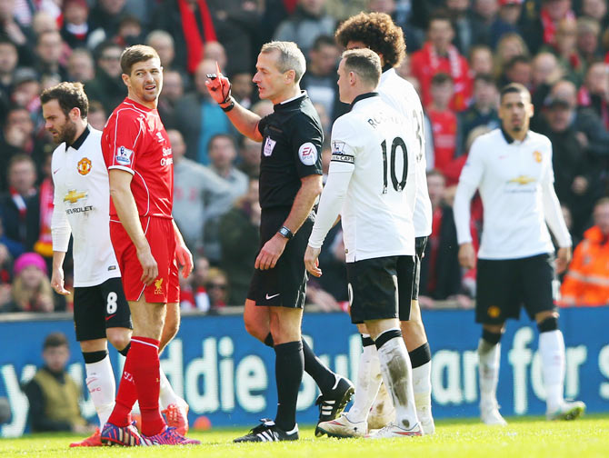 Liverpool's Steven Gerrard is shown the red card