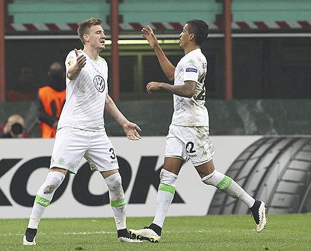 VfL Wolfsburg's Nicklas Bendtner (left) and team-mate Luiz Gustavo celebrate a goal 