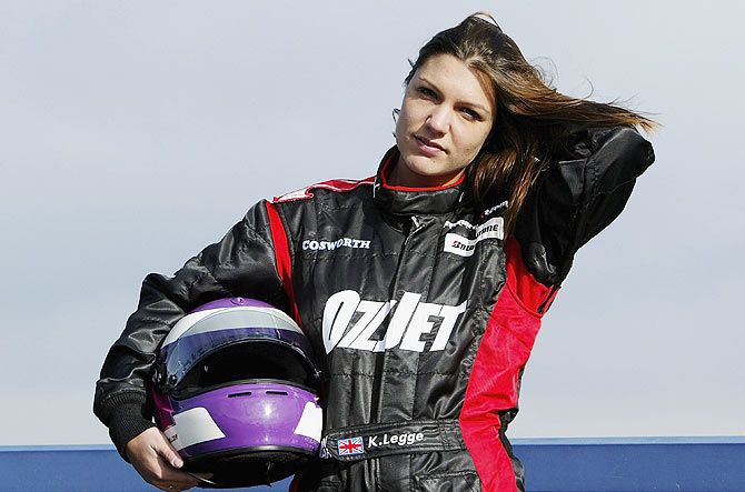 Katherine Legge of Great Britain poses before driving a Minardi Formula One car in a test on November 22, 2005 in Vallelunga, Italy