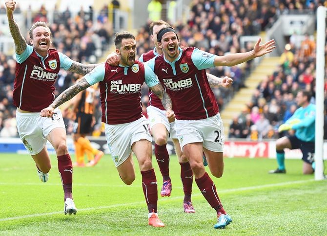 Danny Ings, centre, of Burnley celebrates 