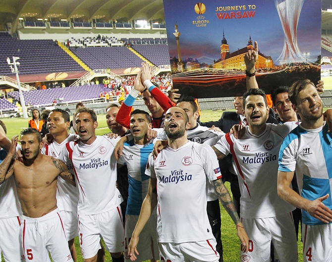 Players of FC Sevilla celebrate