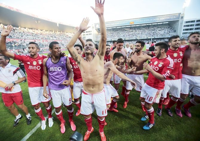 Benfica's team celebrate the league title 