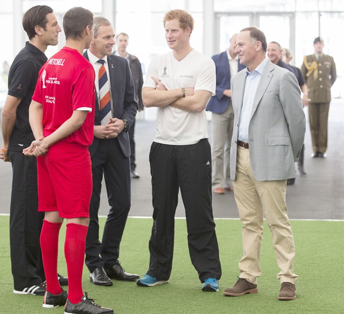  Prince Harry chats to New Zealand Prime Minister John Key