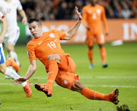 Netherlands' Robin van Persie falls during the match against Czech Republic during their Euro 2016 group A qualifying match in Amsterdam, on October 13
