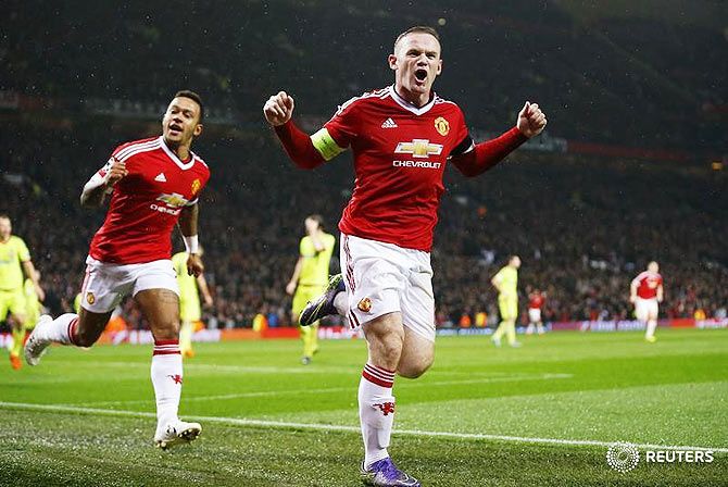 Manchester United's Wayne Rooney celebrates scoring their first goal