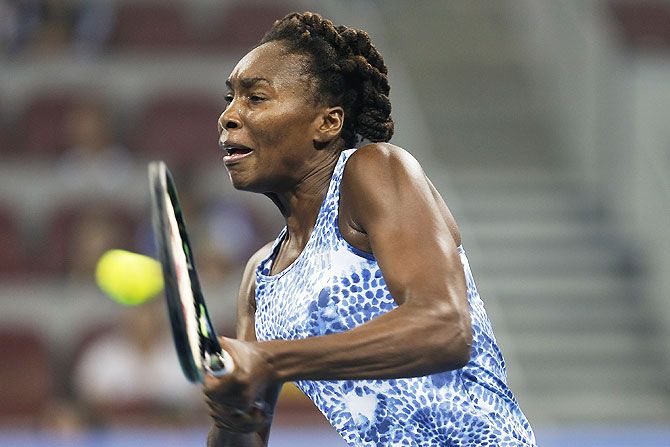 United States' Venus Williams returns a shot