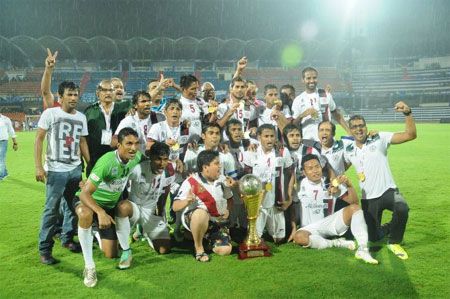 Mohun Bagan players celebrate after winning the I-League