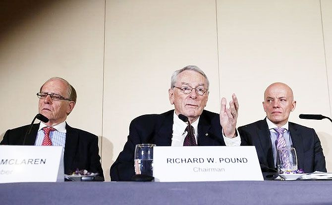 WADA Founding President and former IOC Vice President Richard W. Pound (centre) speaks next to Legal Counsel and member of the Court of Arbitration for Sport (CAS) Richard H. McLaren (left) and Head of Department Cybercrime with Bavarian Landeskriminalamt (LKA) Guenter Younger during a news conference