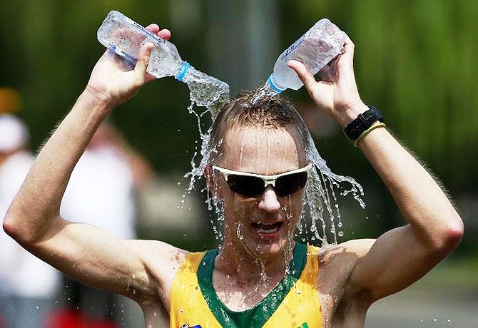 Jared Tallent of Australia cools himself down during the men's 50km race walk final at the 15th IAAF Championships at the National Stadium in Beijing