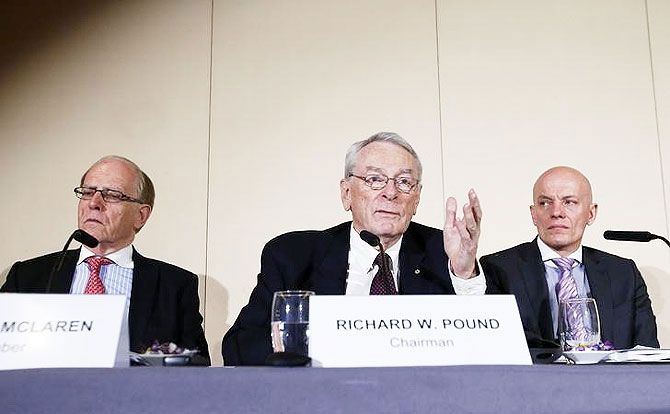 : WADA Founding President and former IOC Vice President Richard W. Pound (centre) speaks next to Legal Counsel and member of the Court of Arbitration for Sport (CAS) Richard H. McLaren (left) and Head of Department Cybercrime with Bavarian Landeskriminalamt (LKA) Guenter Younger during a news conference