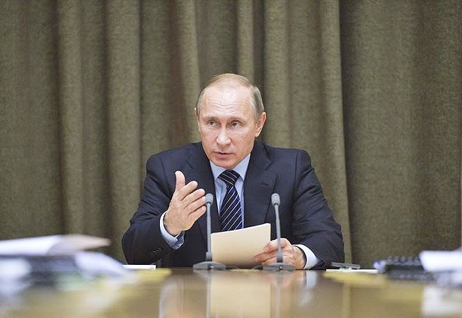 Russian President Vladimir Putin chairs a meeting at the Bocharov Ruchei state residence in Sochi on Wednesday
