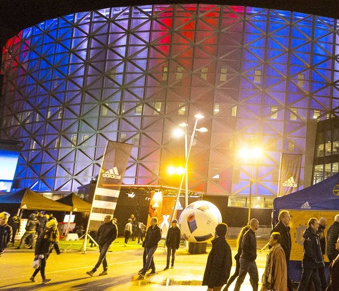 Friends Arena lit in the colors of the French flag