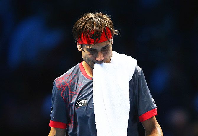 Spain's David Ferrer reacts after losing a point