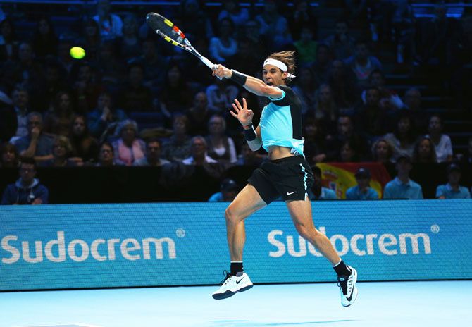 Rafael Nadal plays a forehand