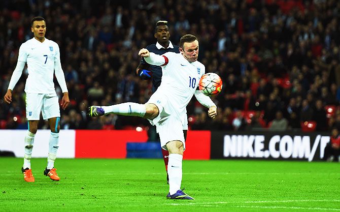England's Wayne Rooney scores his team's second goal