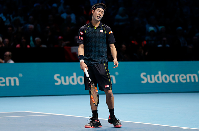 Japan's Kei Nishikori looks dejected during his match against Switzerland's Roger Federer 