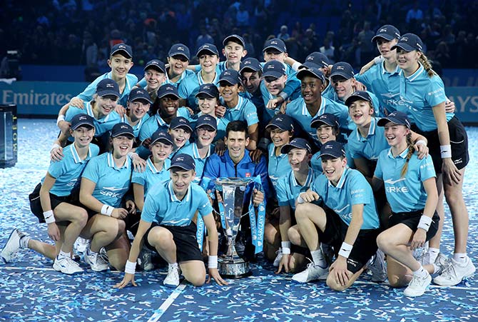 Serbia's Novak Djokovic celebrates with the trophy  
