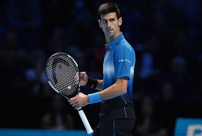 Serbia's Novak Djokovic reacts during his match against Switzerland's Roger Federer 