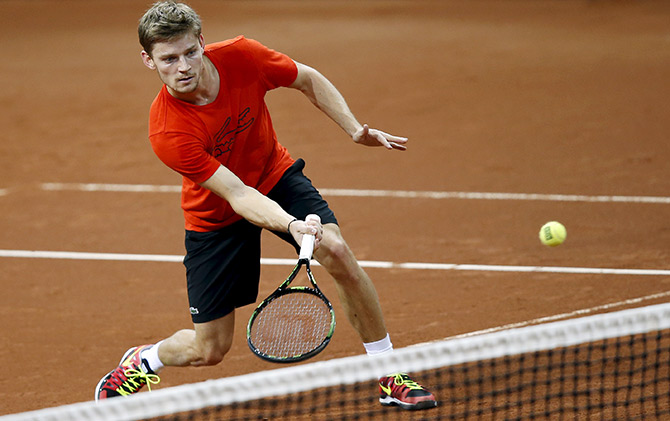 Belgium's David Goffin returns volley during a training session ahead of the Davis Cup final against Britain  