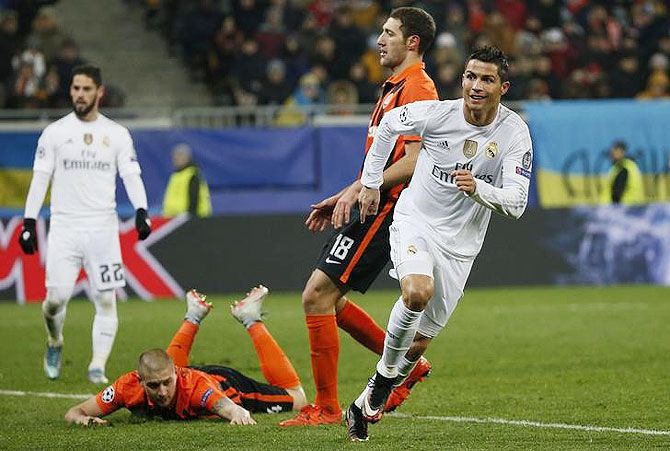 Real Madrid's Cristiano Ronaldo celebrates after scoring a goal against Shakhtar Donetsk