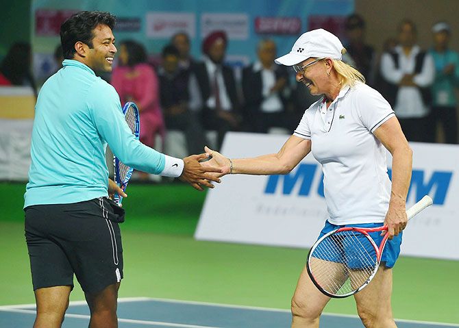 Tennis stars Martina Navratilova and Leander Paes during a a mixed doubles exhibition match in DLTA complex, in New Delhi, on Friday