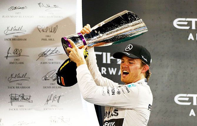 Nico Rosberg celebrates on the podium after winning the Abu Dhabi F1 Grand Prix on Sunday