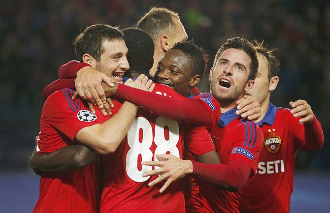 CSKA Moscow's Seydou Doumbia (2nd from left) celebrates with teammates after scoring from the spot against PSV Eindhoven during their Champions League group B match at the Arena Khimki stadium outside Moscow, on Wednesday