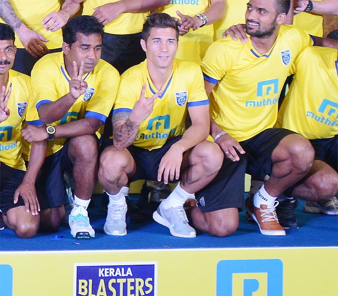 Josue Currais Preito with his Kerala Blasters' teammates during a photocall