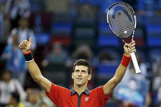 Serbia's Novak Djokovic  celebrates after defeating Spain's Feliciano Lopez at the Shanghai Masters tennis tournament in China on Thursday