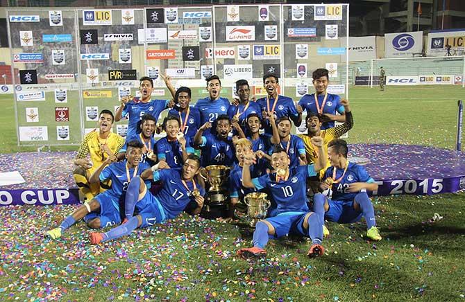 Jubilant AIFF Academy colts pose after winning the Subroto Cup 