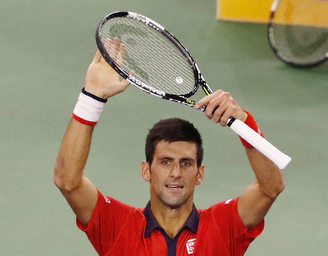 Novak Djokovic of Serbia reacts after winning the match against Andy Murray of Great Britain in his semi-final in Shanghai 