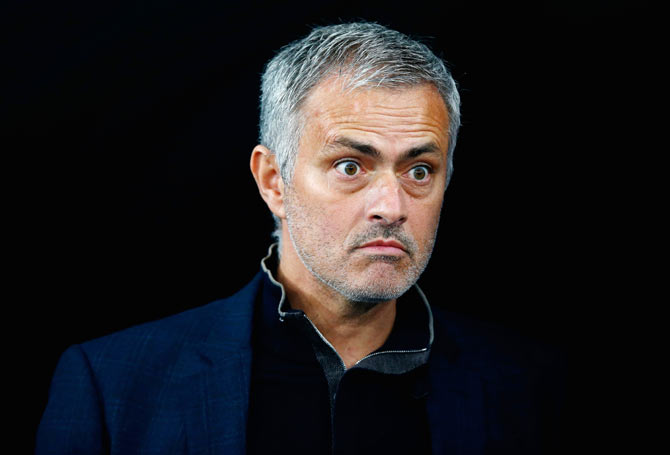 Chelsea's Jose Mourinho looks on