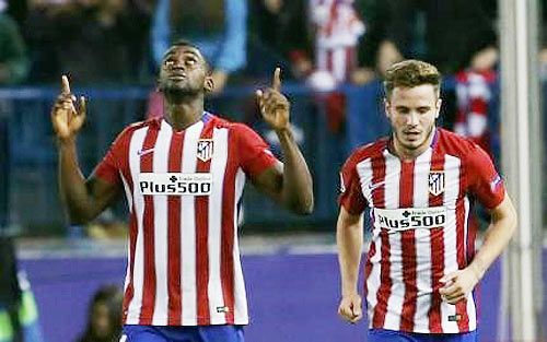 Atletico Madrid's Jackson Martinez (left) celebrates next to teammate Saul Niguez after scoring a goal against Astana during their Champions League Group C match at Vicente Calderon stadium in Madrid on Wednesday