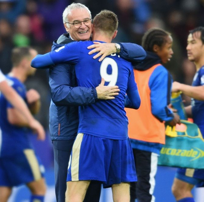 Claudio Ranieri, left, Manager of Leicester City congratulates Jamie Vardy