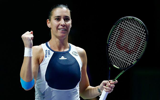 Flavia Pennetta of Italy celebrates match point 